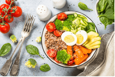 A balanced nutrient-dense meal with eggs, vegetables, whole grains, and healthy fats, supporting endurance, strength, fat loss, and general fitness nutrition.